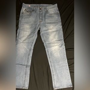 A pair of Vintage True Religion jeans a limited edition & are still like new